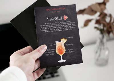 woman hand holding cocktail card